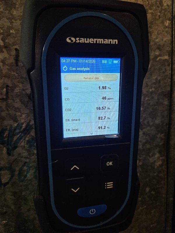 Performed annual maintenance tune-up on 30-year-old furnace. Conducted combustion analysis with Sauermann analyzer, which showed acceptable oxygen levels (3.86% and 1.98%), CO readings (0-46 ppm), and CO2 levels (9.54%-10.57%). System operating at 80.6-82.7% efficiency, which is within expected range for equipment of this age.