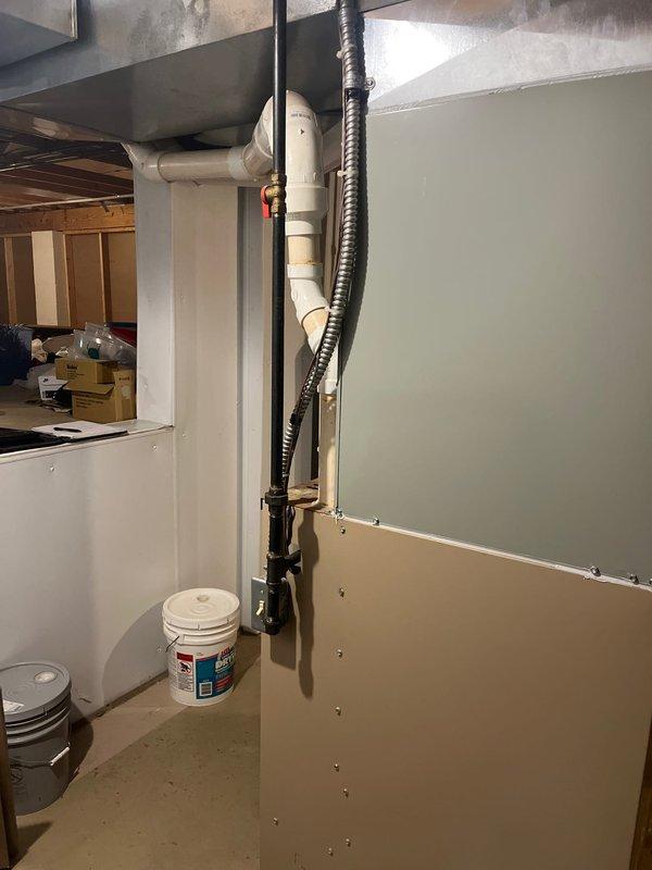 Conducted site assessment of unfinished basement area for HVAC replacement. Evaluated existing ductwork configuration and PVC ventilation system. Documented current mechanical system layout, noting exposed ceiling infrastructure and basement conditions for proper equipment sizing and installation planning.