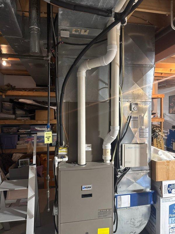 Responded to callback regarding non-functioning basement zone. Inspected York furnace system and identified issue with zone damper actuator (ID10KZ0). Reconnected loose wiring connections on the zone control module and verified proper operation of the basement zone damper. System now functioning normally with all zones responding correctly to thermostat calls.