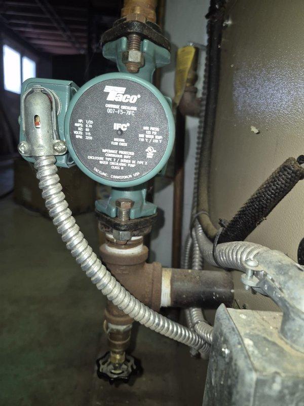 Responded to no heat call at residential property with furnace of unknown age. Diagnosed issue with Taco circulation pump in hydronic heating system. Inspected electrical connections at control box and verified proper wiring to pump assembly. System restored to normal operation after servicing pump and checking all associated valves and connections in the copper pipe distribution network.