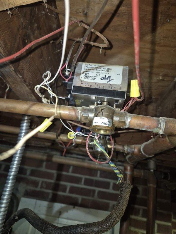 Responded to no heat call at residential property with furnace of unknown age. Diagnosed issue with Taco circulation pump in hydronic heating system. Inspected electrical connections at control box and verified proper wiring to pump assembly. System restored to normal operation after servicing pump and checking all associated valves and connections in the copper pipe distribution network.