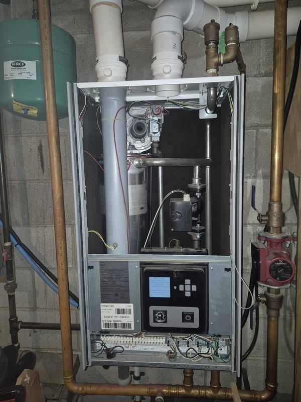 Responded to no-heat emergency call for boiler failure during extreme cold conditions. Upon inspection, identified combustion efficiency issues with the system operating at only 82.0% efficiency and elevated CO levels at 66 ppm. Performed combustion analysis using Bacharach analyzer, adjusted air-fuel mixture, and serviced control board to restore proper heating function and improve safety parameters.