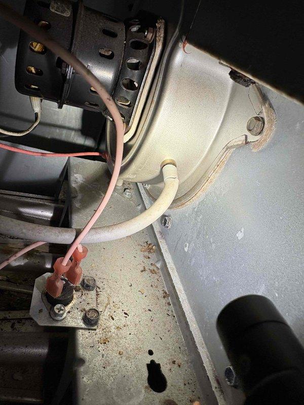 Performed scheduled commercial heating maintenance service. Utilized specialized hand tools to access interior components of the HVAC system. Inspected blower motor assembly, wiring connections, and terminal points, noting minor corrosion and dust accumulation on internal components.