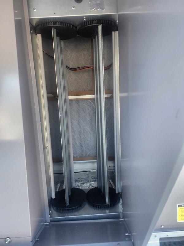 Completed installation of new commercial HVAC system with dual heat transfer elements. Installed vertical finned heat exchanger components within the air handling unit and connected appropriate electrical wiring to control mechanisms. System was properly mounted, sealed, and verified operational with all safety components in place.