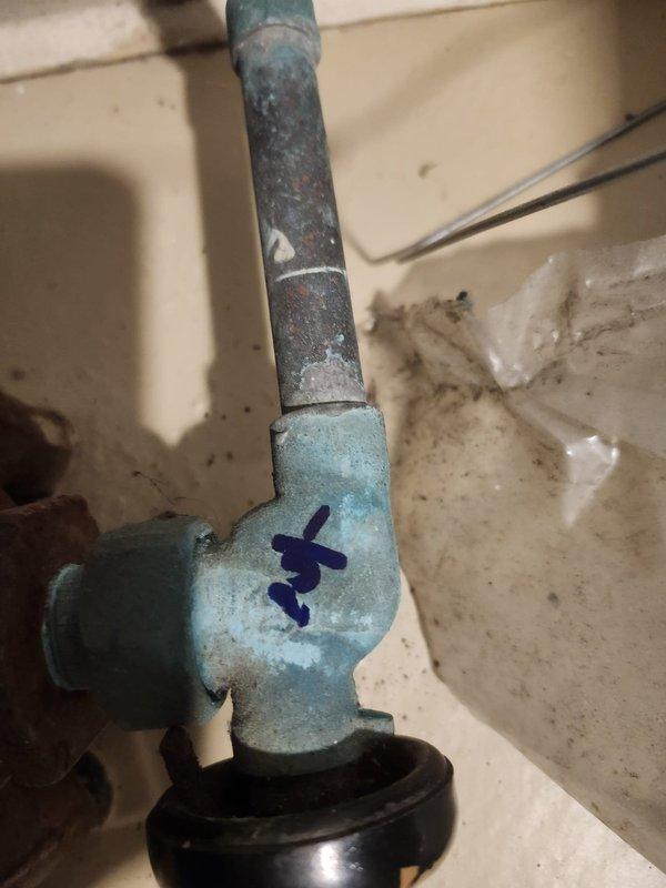 Responded to no-heat complaint at housing unit. Upon inspection, discovered corroded copper piping with significant oxidation and mineral buildup in the furnace's plumbing components. Found water damage to surrounding wooden structure indicating possible long-term moisture exposure. Marked affected sections for future reference after completing necessary repairs to restore heating functionality.