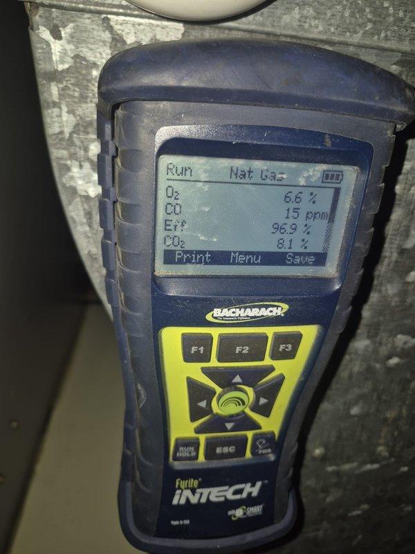 Responded to service call for furnace running continuously with insufficient heat. Performed diagnostic testing with Bacharach Fyrite INTECH analyzer which confirmed proper combustion parameters (O₂: 8.6%, CO: 15ppm, CO₂: 8.1%, efficiency: 96.9%). Inspected crawlspace to verify proper ventilation and completed system check to restore normal heating operation.