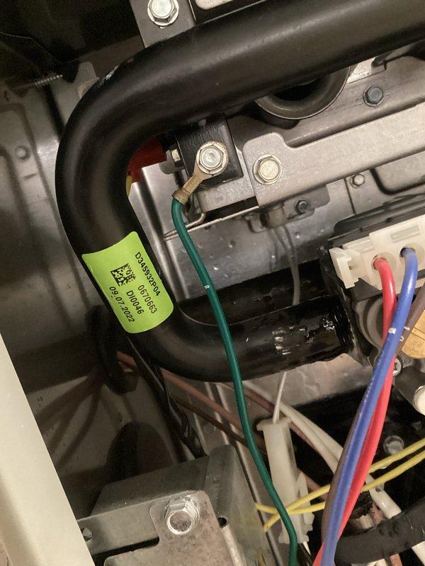 Inspected HVAC system due to reported gas leak. Conducted thorough examination of gas line components including the main PVC supply line and black rubber gas hose with green identification label. Checked all connections, brackets, and electrical components associated with the gas system, confirming proper installation and sealing of all gas-carrying components.