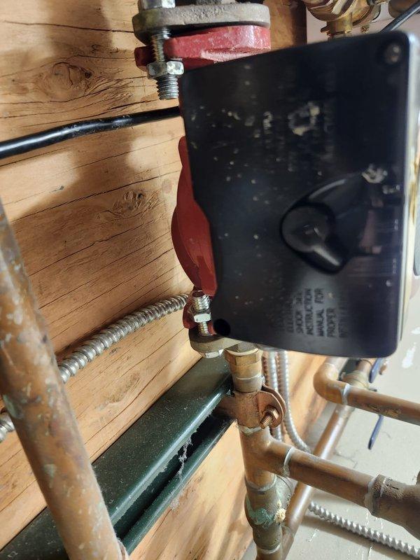 Responded to no hot water complaint. Inspected boiler system and found faulty Grundfos ASTRO 280CI circulation pump. Replaced defective pump and tested control valve operation. System now functioning properly with adequate hot water flow restored.