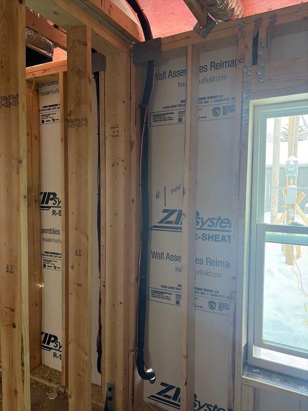 Completed rough-in phase of commercial HVAC installation in new construction building with wooden framing. Installed ductwork and mechanical components while coordinating with electrical and plumbing contractors during the pre-drywall stage. Ensured proper integration with the ZIP System sheathing and insulation for optimal system efficiency.