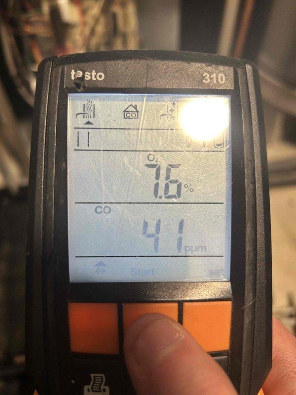 Performed scheduled heating system tune-up during evening appointment window. Conducted combustion analysis using Testo 310 analyzer, measuring oxygen content (7.6%) and carbon monoxide levels (initially 65 ppm, reduced to 41 ppm). System now operating within acceptable parameters.