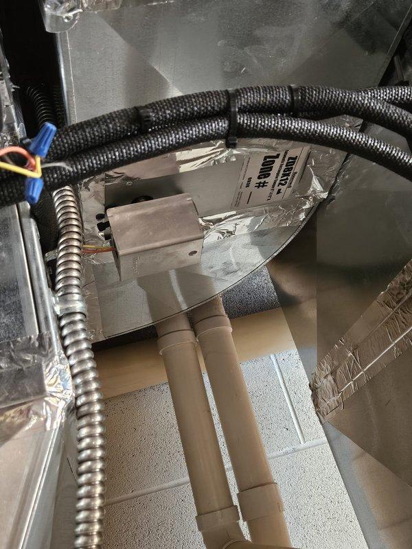 Performed diagnostic assessment on 16-year-old zoning gas furnace system where master bedroom thermostat was not maintaining set temperature (climbing from 69°F to 73°F). Inspected ductwork connections, wiring, and zone control components. Identified and corrected improper damper operation causing excess heat delivery to master zone.