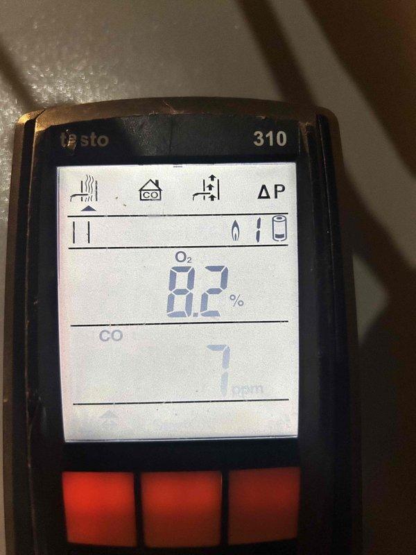 Performed routine furnace maintenance under existing service plan for 10-year-old unit. Conducted combustion analysis using Testo 310 analyzer, confirming proper operation with O₂ readings of 8.2% and safe CO levels of 7-12 ppm. All systems functioning within normal parameters; unit is properly maintained with service plan valid through 2026.