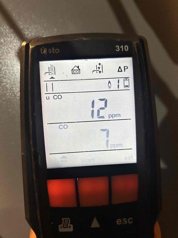 Performed routine furnace maintenance under existing service plan for 10-year-old unit. Conducted combustion analysis using Testo 310 analyzer, confirming proper operation with O₂ readings of 8.2% and safe CO levels of 7-12 ppm. All systems functioning within normal parameters; unit is properly maintained with service plan valid through 2026.