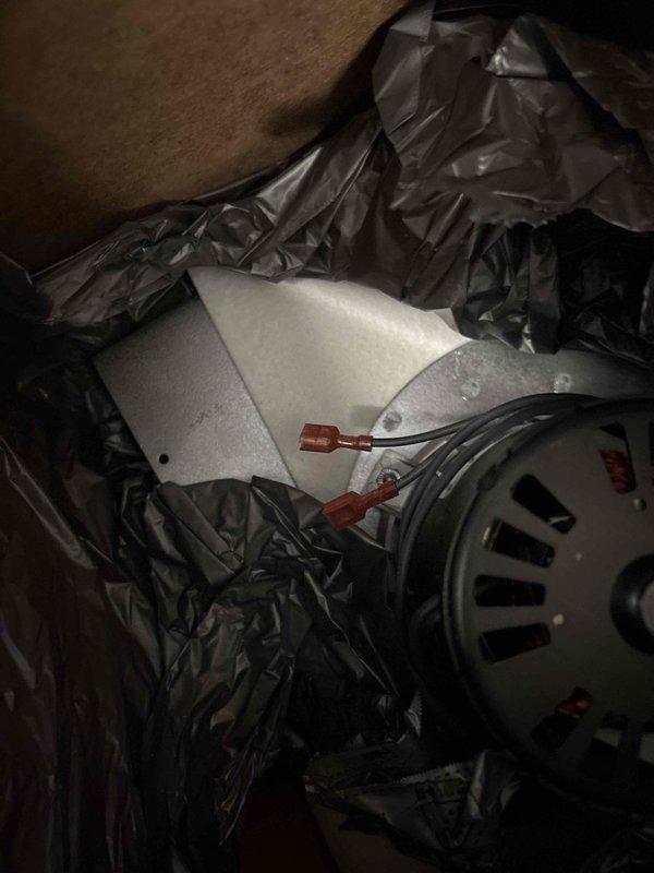 Performed furnace repair service on commercial unit. Replaced failed blower motor with new component, removing protective packaging and connecting wiring harness with appropriate terminal connections. Verified proper installation and operation after replacement.