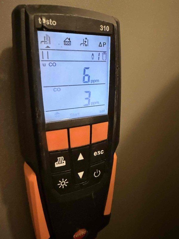 Performed tune-up on 15-year-old furnace that was cycling on/off. Conducted combustion analysis using Testo 310, which showed acceptable CO readings between 6-7 ppm and O₂ levels at 8.4%. System is now operating within normal parameters under existing service agreement.