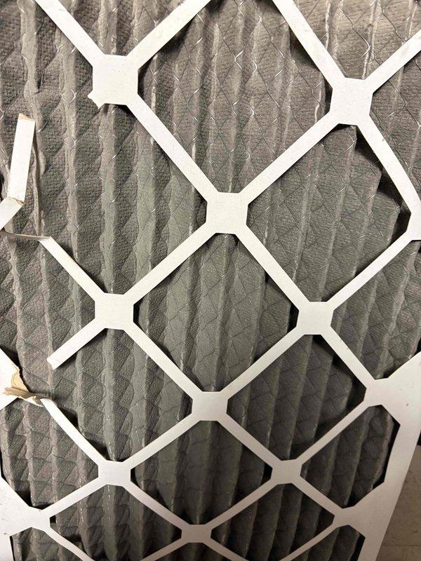Responded to commercial furnace service call for non-operational system. Inspected and replaced dirty air filter that was restricting airflow. Noted water staining on ceiling tile near air diffuser which may indicate previous condensate leak. System functioning properly after service.