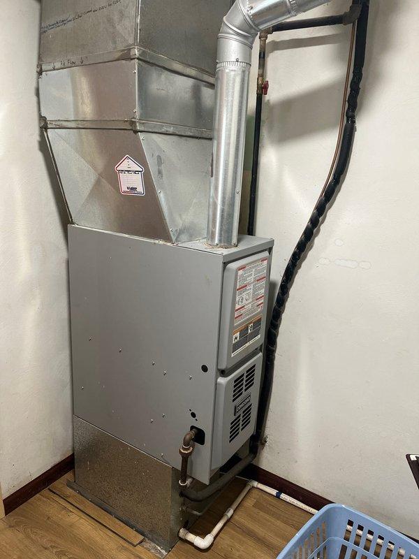 Performed diagnostic assessment of non-functioning heating system. Recommended complete replacement of existing furnace and A/C unit due to failure. Conducted site evaluation in utility room where current furnace is installed adjacent to water heater and laundry equipment. Documented existing ductwork configuration and available space for new system installation.