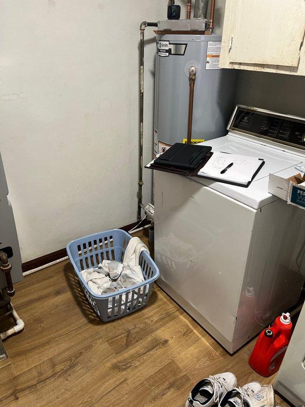 Performed diagnostic assessment of non-functioning heating system. Recommended complete replacement of existing furnace and A/C unit due to failure. Conducted site evaluation in utility room where current furnace is installed adjacent to water heater and laundry equipment. Documented existing ductwork configuration and available space for new system installation.