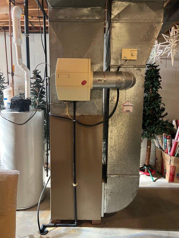 Performed assessment for furnace replacement of 30-year-old unit located in basement utility room. Current system includes aging furnace with metal ductwork connecting to main distribution system. Water heater appears to be in working condition and would not require replacement as part of this project. Recommended full furnace replacement with appropriately sized unit to integrate with existing ductwork configuration.