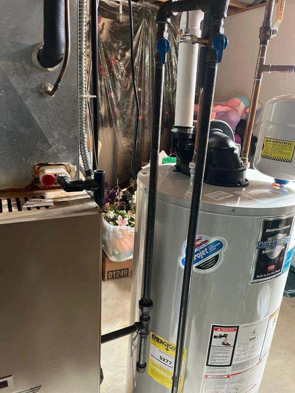 Performed assessment for furnace replacement of 30-year-old unit located in basement utility room. Current system includes aging furnace with metal ductwork connecting to main distribution system. Water heater appears to be in working condition and would not require replacement as part of this project. Recommended full furnace replacement with appropriately sized unit to integrate with existing ductwork configuration.