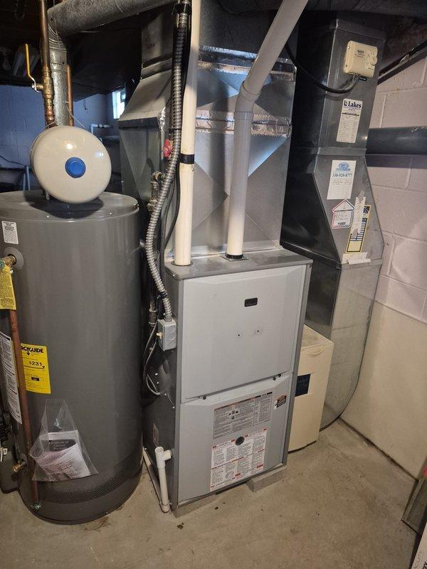 Performed fall maintenance service on residential heating system. Inspected furnace, ductwork, and ventilation components - all found in good working condition with proper connections. No issues identified with the HVAC equipment or associated PVC exhaust system.