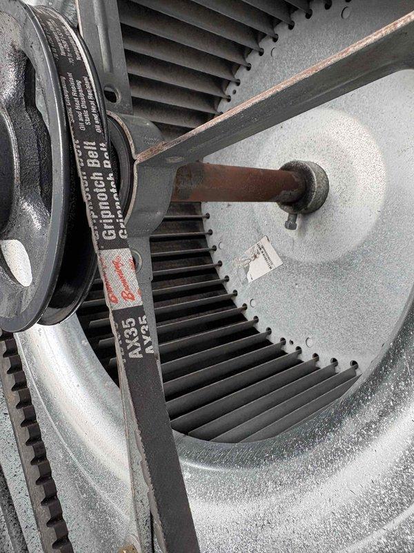 Performed scheduled fall maintenance on commercial HVAC system. Inspected drive belt (AX35) and blower assembly for proper tension and alignment. Visual examination confirmed components are in functional condition with normal wear.