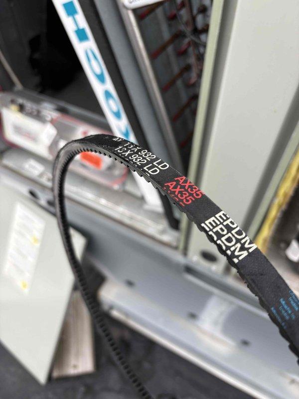 Performed scheduled fall maintenance on commercial HVAC system. Inspected drive belt (AX35) and blower assembly for proper tension and alignment. Visual examination confirmed components are in functional condition with normal wear.