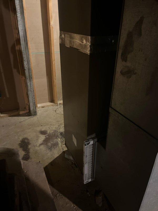 Conducted inspection of existing HVAC system in unfinished construction space, documenting the current furnace installation and ductwork configuration. Provided replacement estimate for upgrading the aging furnace unit, which includes replacement of the metal cabinet unit and optimization of the curved metallic ductwork system with proper insulation for improved efficiency.