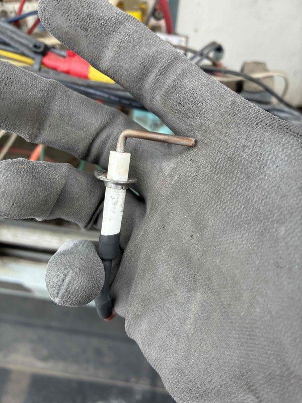 Performed scheduled commercial heating maintenance and identified significant corrosion on system piping. Removed and inspected temperature probe/sensor, which showed signs of wear. Documented condition with photos for future reference and customer records.