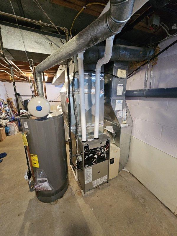 Successfully installed a new high-efficiency furnace in the basement utility room, including proper connection to existing ductwork with sealed joints and installation of PVC ventilation pipes. All electrical connections were completed according to code, and the system was tested for proper operation alongside the existing water heater.