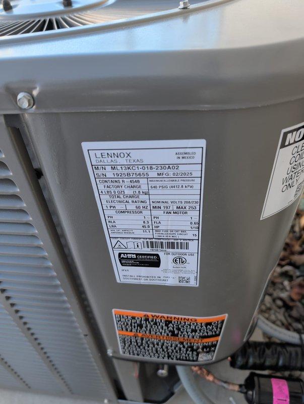 Successfully installed a new Lennox ML13XC1-018-230A02 condensing unit operating on R-410A refrigerant. Unit was properly positioned on a gravel base with concrete pad, with insulated refrigerant lines routed and secured to the exterior wall through appropriate wall penetration. System was charged according to manufacturer specifications and verified for proper operation.