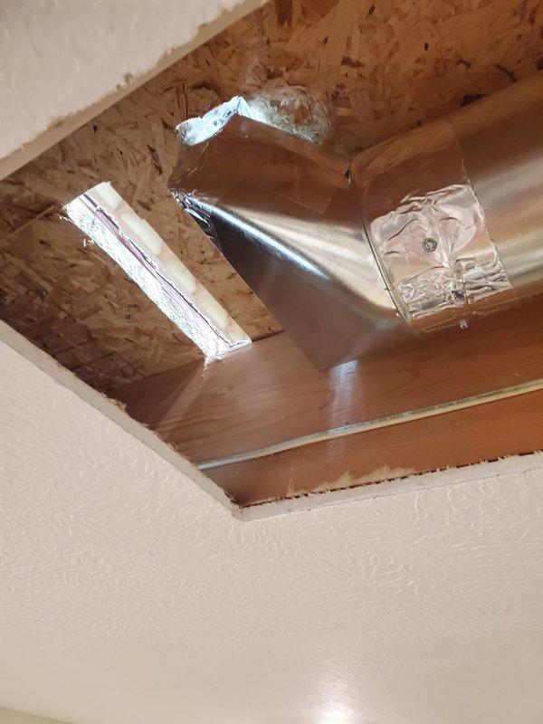 Responded to callback regarding exterior wall heat run. Accessed and inspected exposed ductwork in ceiling and wall cavity. Properly secured and sealed metal duct connections with appropriate metal tape, ensuring proper airflow path and eliminating potential leakage at bend sections.