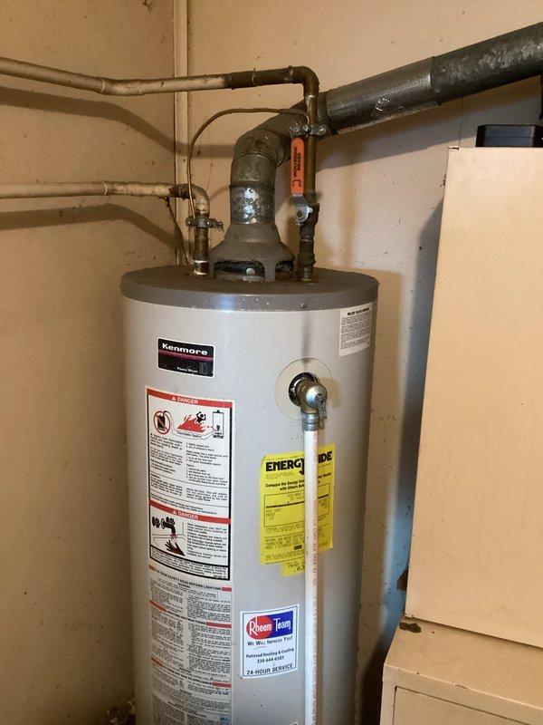Responded to service call for leaking Kenmore water heater. Upon inspection, confirmed tank failure requiring complete replacement. Installed new water heater, connected to existing copper and PVC plumbing system, and verified proper operation before leaving premises.