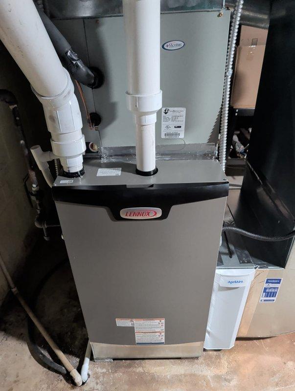 Successfully installed a new Lennox furnace system in the utility room, including proper connection of all PVC ventilation pipes, electrical conduit, and integration with existing HVAC components. Exterior work required ladder access to complete the installation, with all systems tested and confirmed operational according to manufacturer specifications.