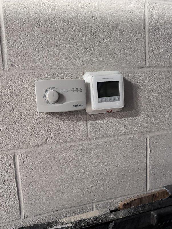 Successfully installed and configured AprilAire humidifier system per service request. Connected unit to existing HVAC controls, ensuring proper integration with the digital programmable thermostat. Verified system functionality with humidity control dial calibrated to optimal settings for the space.