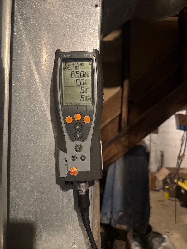 Performed furnace clean and check service as scheduled. Conducted combustion analysis using Testo 327-1 analyzer, documenting readings of 650 ppm CO2, 86% efficiency, and low CO levels (5-8 ppm). Inspected ductwork system including metal trunk lines and connections, verifying proper installation and sealing at all joints.