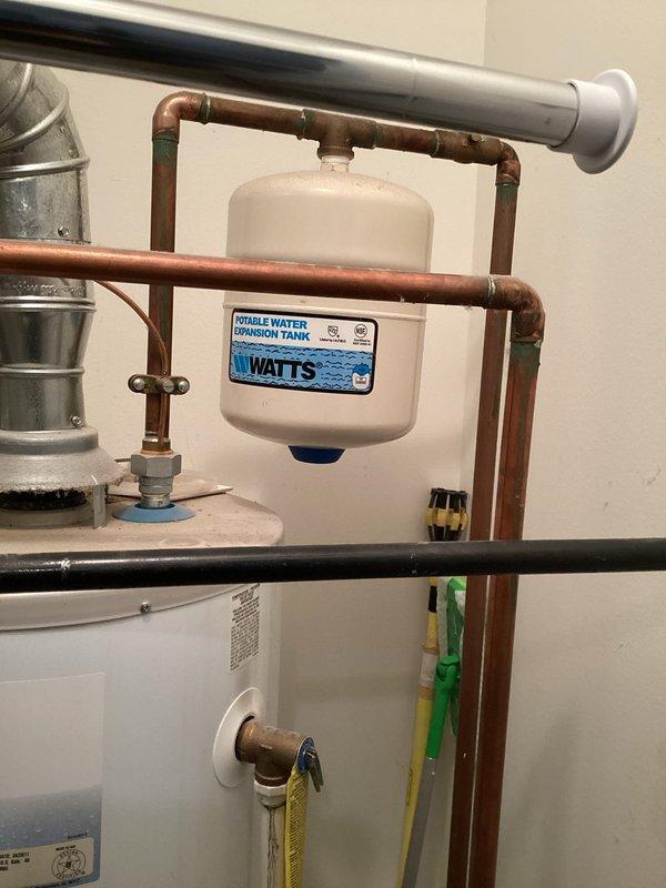 Repaired leaking bathtub faucet by replacing worn components in the valve assembly, eliminating the persistent drip. Inspected the existing potable water expansion tank and associated copper piping, noting minor corrosion at joints but confirming system remains in operational condition.