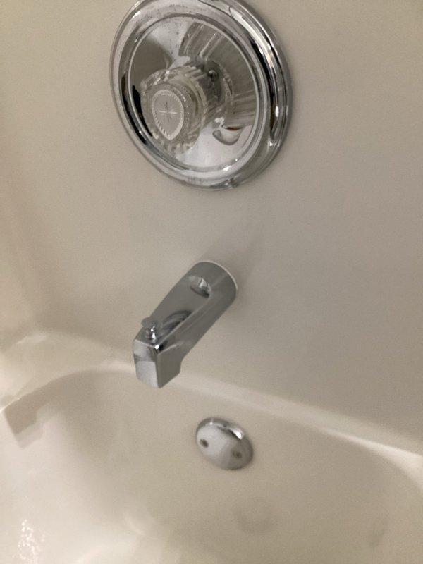 Repaired leaking bathtub faucet by replacing worn components in the valve assembly, eliminating the persistent drip. Inspected the existing potable water expansion tank and associated copper piping, noting minor corrosion at joints but confirming system remains in operational condition.