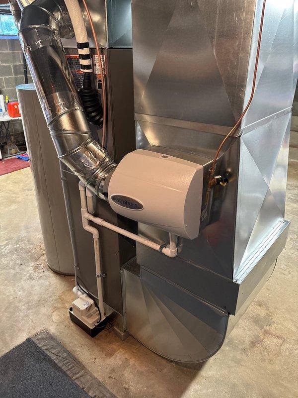 Successfully completed a furnace/AC retrofit installation in the basement, featuring a new Lennox furnace system with properly connected PVC venting, ductwork, and humidifier. Installation included all necessary electrical connections, copper line sets, and proper exhaust ventilation, with all components tested for optimal operation.