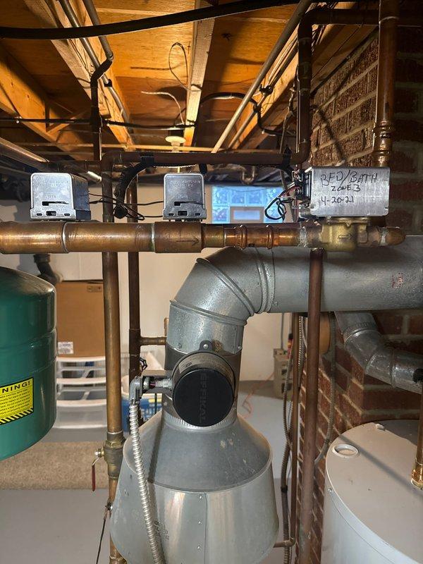 Performed routine furnace clean and check in residential utility area. Inspected all plumbing connections, HVAC components, and control systems. Verified proper operation of pressure tank and ventilation system with circular damper, ensuring all systems are functioning according to manufacturer specifications.