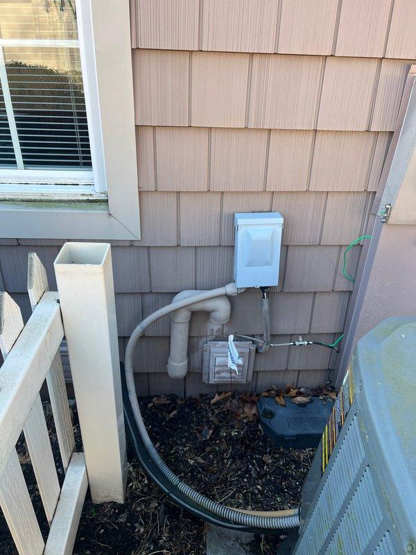 Completed furnace retrofitting in utility room of residential property. Existing HVAC system was evaluated alongside water heater configuration to ensure proper integration. Exterior electrical connections were inspected and secured with appropriate conduit installation to support the new equipment.