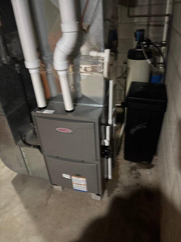 Completed a full furnace retrofit, installing a new Lennox furnace unit with proper PVC ventilation and condensate lines in the utility room. Connected the system to existing ductwork which includes an air purifier/humidifier component. Ensured all connections were secure and system was operating according to manufacturer specifications.