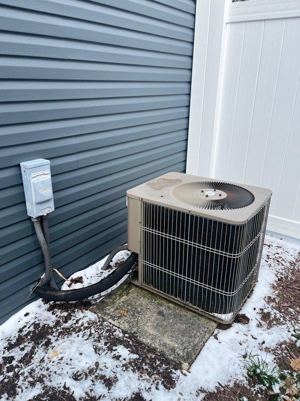 Completed furnace and AC retrofit on existing residential system. Replaced aging outdoor condensing unit, which showed visible wear, with new unit properly installed on existing concrete pad with electrical disconnect. Interior work included replacement of furnace unit in mechanical room, ensuring proper connection to existing ductwork and PVC venting system.