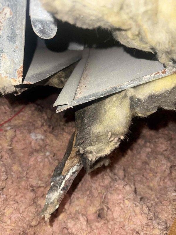 Responded to service call for non-functioning heating system. Inspection revealed disconnected ductwork in attic with visible separation at junction points. Reconnected and sealed disconnected ductwork segments, restoring proper airflow and system functionality.