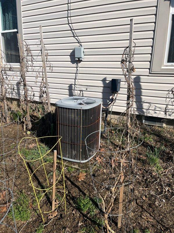 Completed comprehensive AC retrofit for residential property, replacing outdoor condenser unit and coordinating with existing basement furnace system. Installed new condenser on elevated platform against exterior wall with proper electrical conduit connection from junction box, ensuring adequate clearance from surrounding vegetation and structures. Verified proper integration between new outdoor unit and indoor air handler system, including plenum connections and ductwork compatibility with existing HVAC infrastructure in basement utility area.