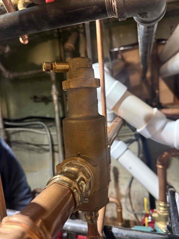 Installed iMag dirt separator on the heating system to remove debris and sediment from the circulating water. Integrated the unit into existing copper piping using appropriate brass fittings and isolation valves to allow for future maintenance. Flushed and cleaned the entire hydronic system to remove accumulated particulates and improve system efficiency and component longevity.