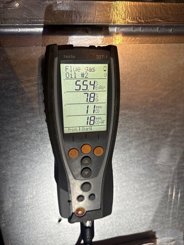 Responded to customer complaint of burning plastic smell from 3-year-old gas furnace. Performed comprehensive system inspection and combustion analysis using Testo 327-1 analyzer. Flue gas readings showed 55.4% combustion air, 78% efficiency, 11 ppm CO, and 18 ppm CO-HF, all within acceptable parameters. Inspected heat exchanger, burner assembly, blower motor, and electrical connections for signs of overheating or melting components. Verified proper operation of PVC venting system and condensate drainage. Checked air handler and ductwork for any foreign materials or debris that could cause odor when heated. System operating normally with no abnormalities detected during inspection. Advised customer that new furnace odors can occur during initial heating cycles but to monitor and contact if smell persists or worsens.