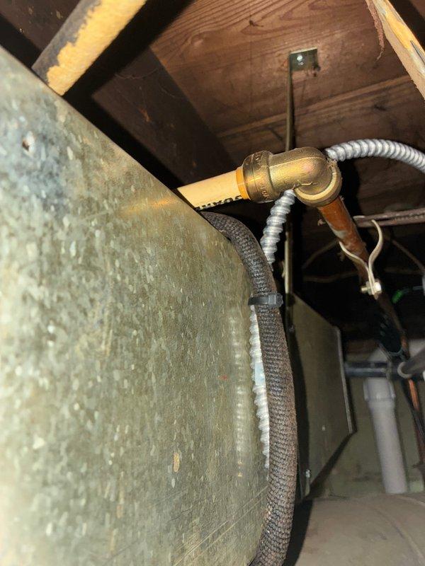 Inspected and evaluated existing boiler control system and associated mechanical components in preparation for equipment estimate. Documented current electrical control board configuration, wiring harnesses, and terminal connections, as well as basement piping infrastructure including copper supply lines, shut-off valves, flexible connectors, and existing ductwork conditions to assess replacement requirements and compatibility for new boiler installation.