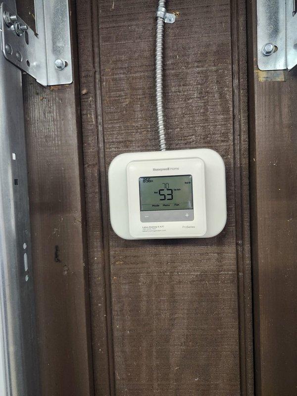 Responded to no heat call on newly installed furnace in pavilion. Upon arrival, found thermostat displaying 53°F and not calling for heat. Inspected furnace control board and electrical connections, verified all wiring terminations at White-Rodgers control module and terminal strips were secure. Cycled thermostat to initiate heat call, confirmed proper communication between thermostat and furnace control board. System now operating normally and providing heat to space.