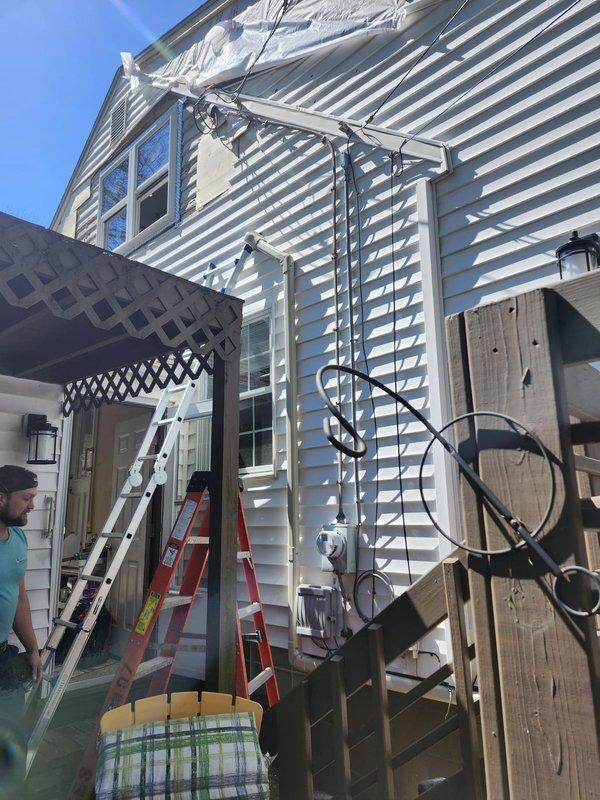 Completed rough-in installation for mini split system at new construction residential property. Ran refrigerant line set and electrical conduit from exterior wall penetration through crawl space beneath floor joists to designated equipment location. Secured all piping and wiring per code requirements, coordinated with project manager to ensure proper placement for final equipment installation phase.